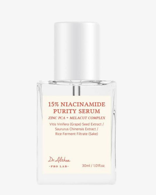 A 30ml bottle of Dr. Alhaa Pro Lab 15% Niacinamide Purity Serum, featuring a clear glass bottle, a white cap, and a cream-colored label with red text.